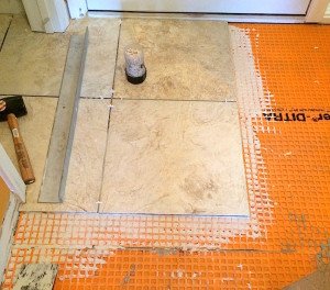 JR Carpentry & Tile has experience installing large format tile.
